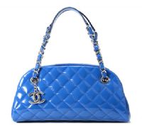 CHANEL Blue patent leather bowling bag